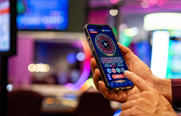Tembak Ikan gameplay on mobile screen showing fish targets and score display